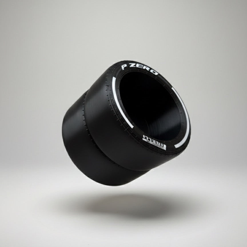 Black tire with 'P Zero' branding on a gray background